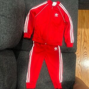 Red Adidas track suit